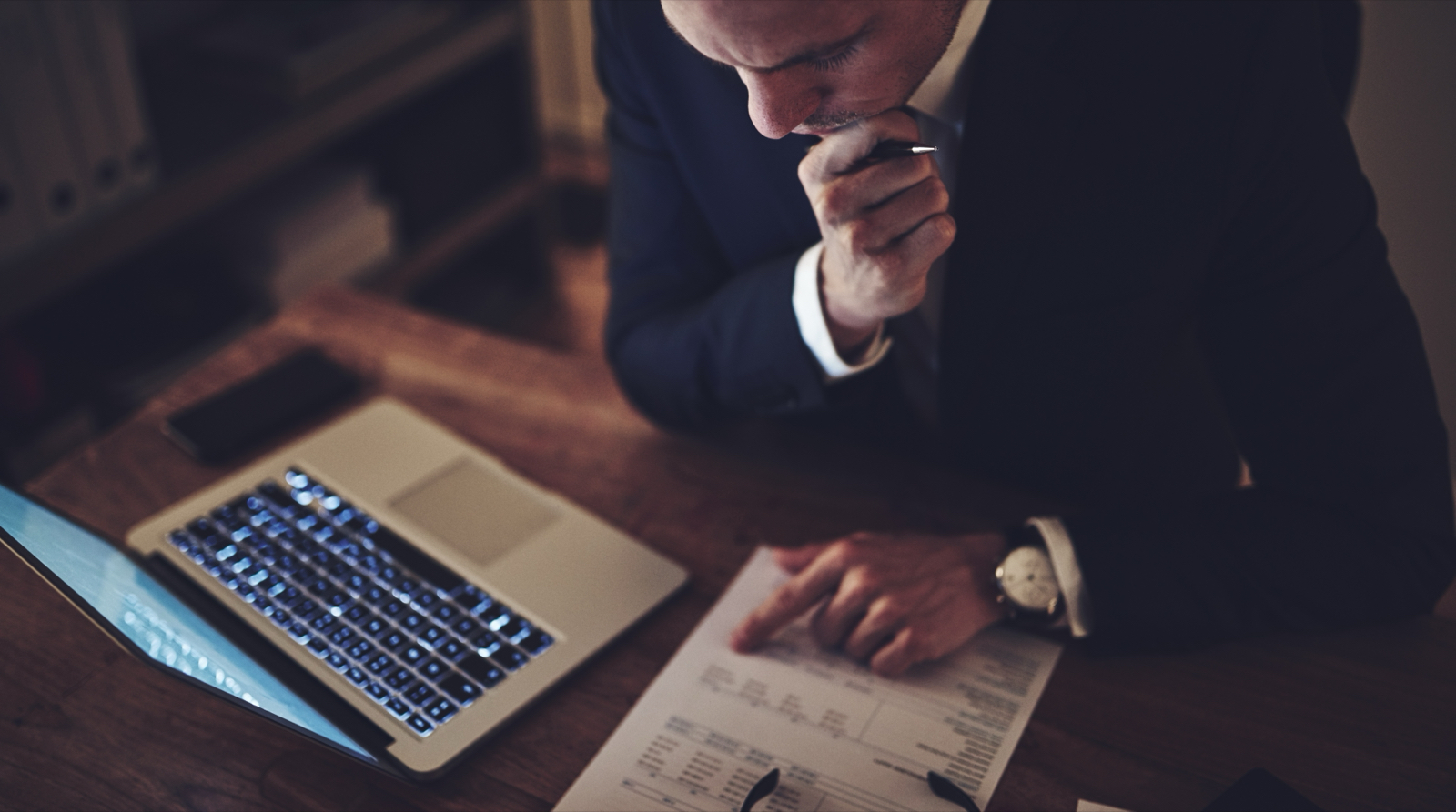 A lawyer working a file late in the evening