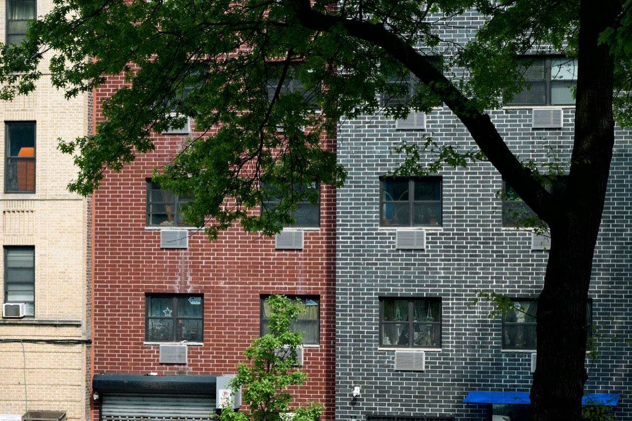Adjoining brick apartment buildings