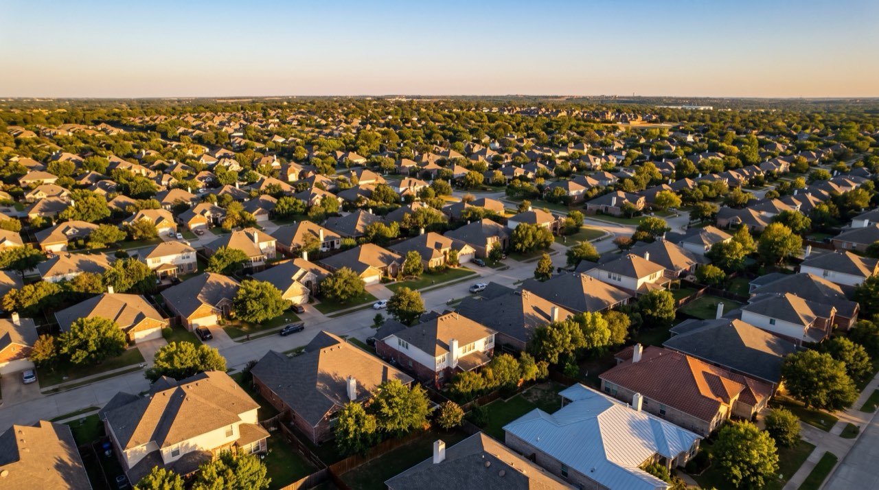 Aerial view of a residential neighbourhood at evening
