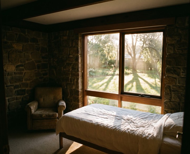 Recovery: a bed by a garden window