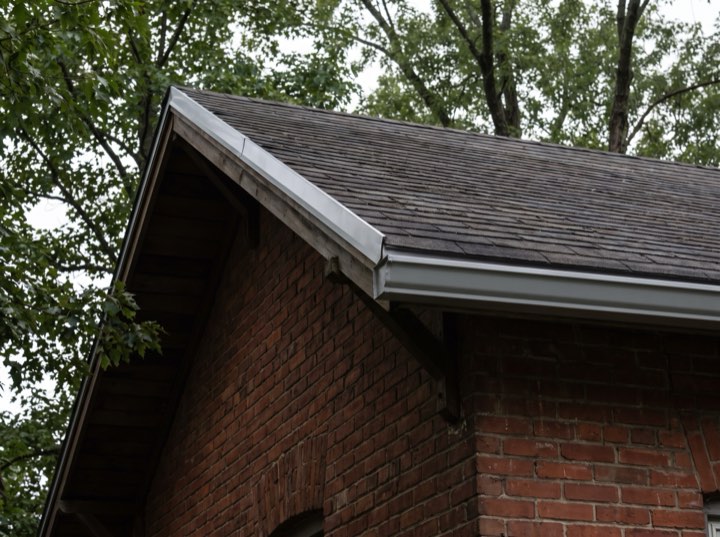 New drip edge and gutter on a finished eave