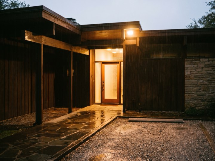 The hospital entrance lit at night